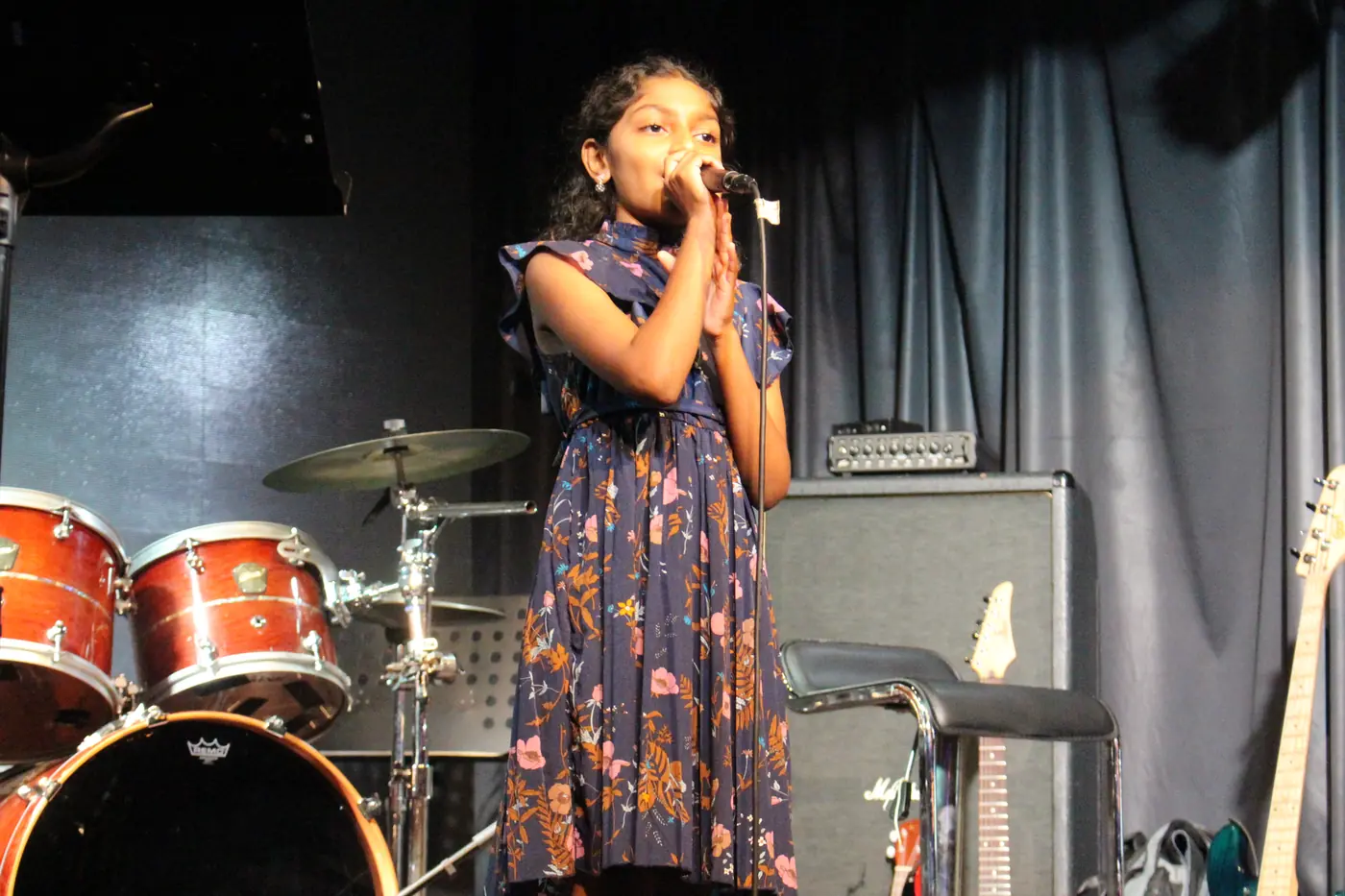 Young singer performing at Open Day 2025