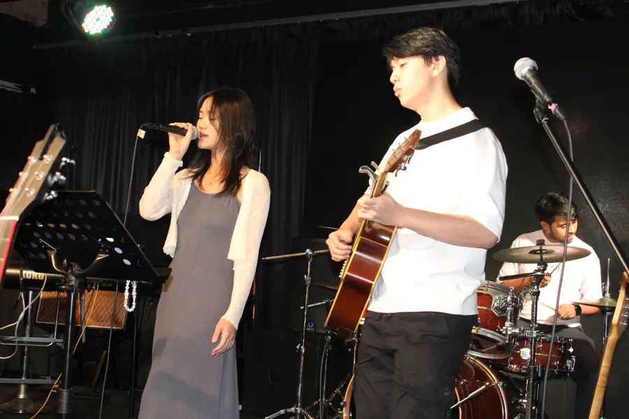 Singer and guitarist at Open Day 2025